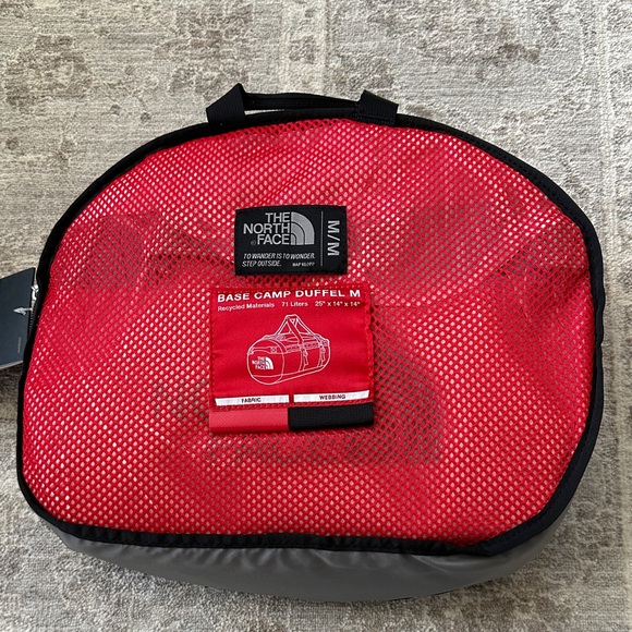 The North Face Red and Black Base Camp Duffel M. 26x14x14. NWT’s.